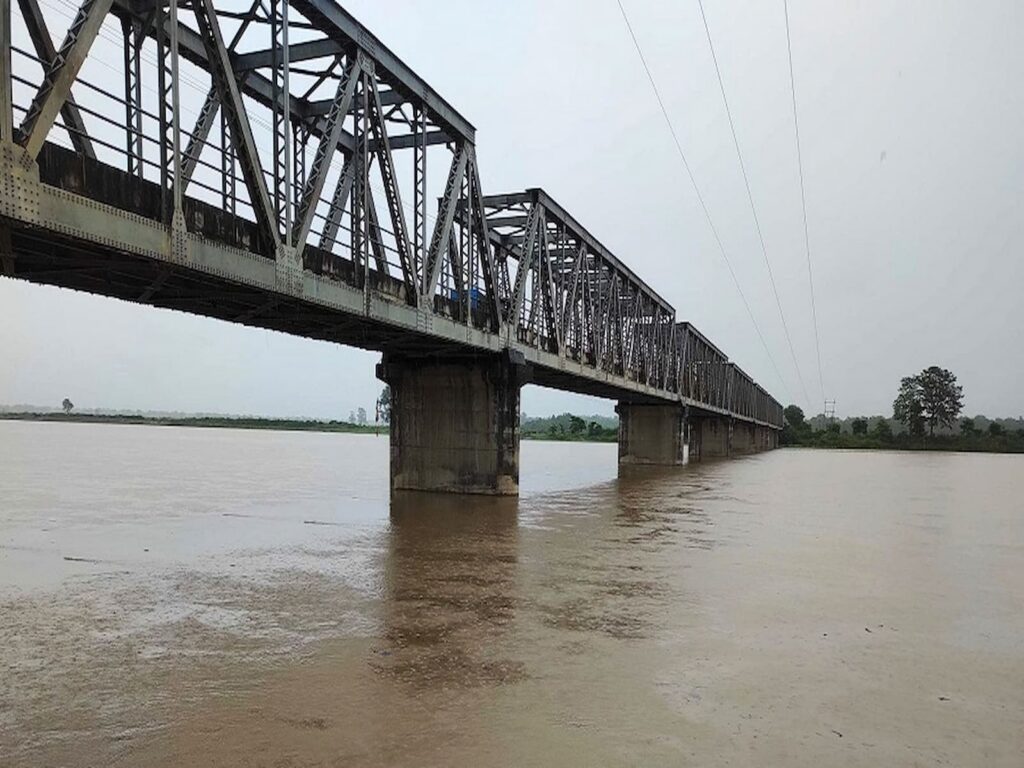 Construction of Earthen Embankment with Launching Apron and Slope Revetment (Ch 12496–13095)